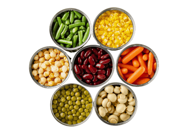 Image shows canned vegetables and mushrooms to illustrate using canned food is not cheating in the kitchen. It's smart and reduce waste.