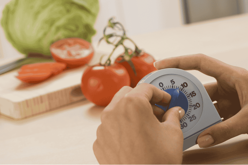 Image illustrates the importance of time in cooking for beginners. Cooking time determines whether a recipe fits into your day or if you need to swap it for something faster.