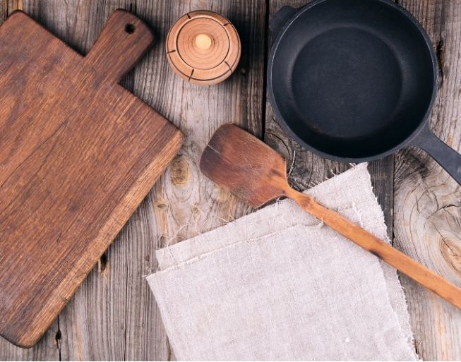 Cooking for beginners - Image shows old style cookware and utensils very used to show it is possible to cook without new and shiny cookware.